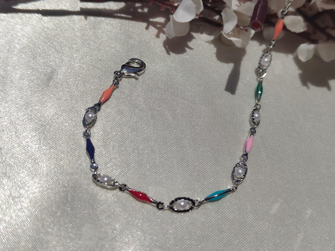 Anti tarnished silver-tone bracelet featuring colorful enamel accents and delicate pearl detailing ✨