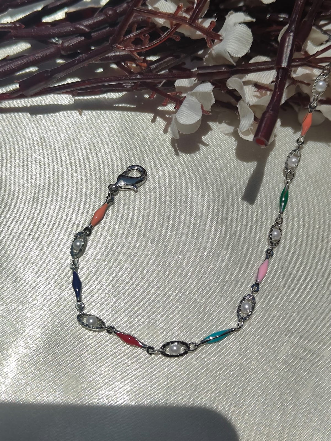 Anti tarnished silver-tone bracelet featuring colorful enamel accents and delicate pearl detailing ✨