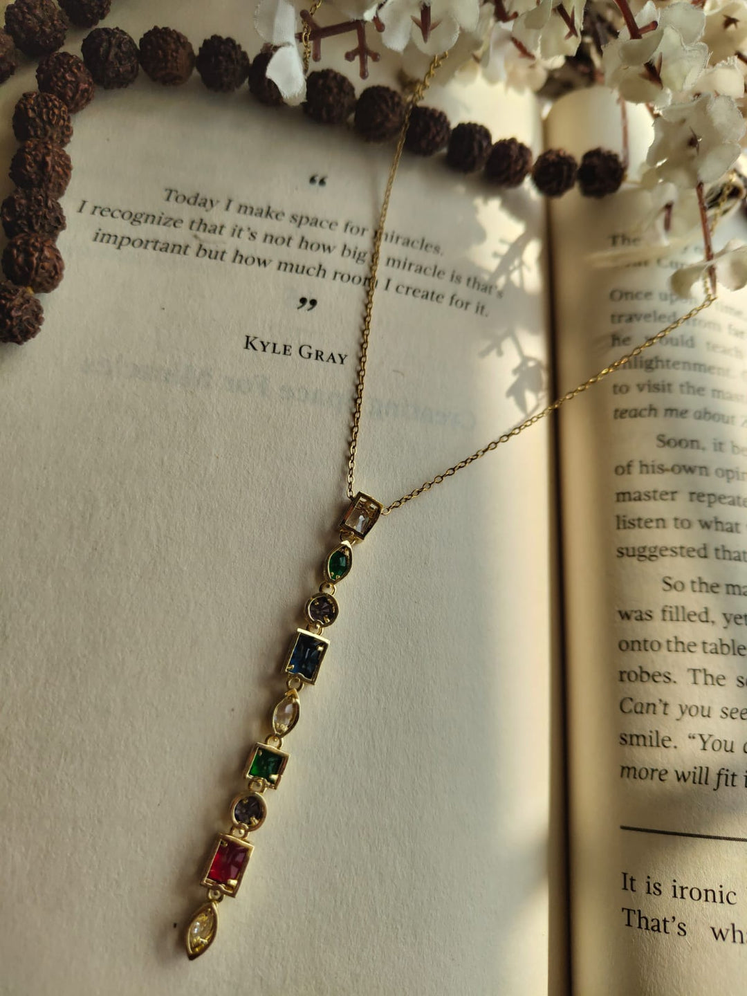 Multicolored stone pendant necklace.