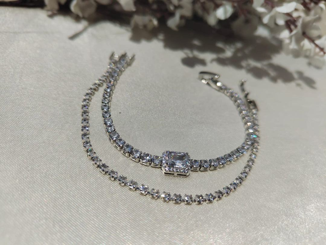 Luxury silver bracelet set featuring dazzling premium-cut stones with an elegant statement centerpiece ✨