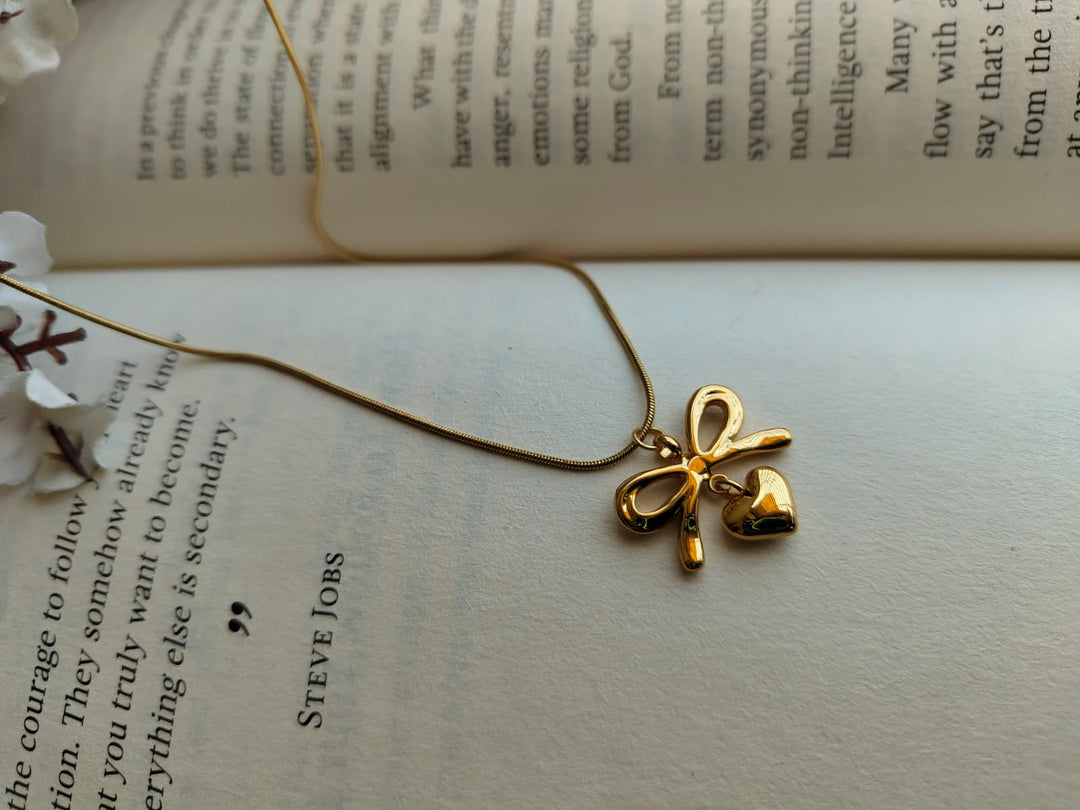 Bow and heart pendant necklace