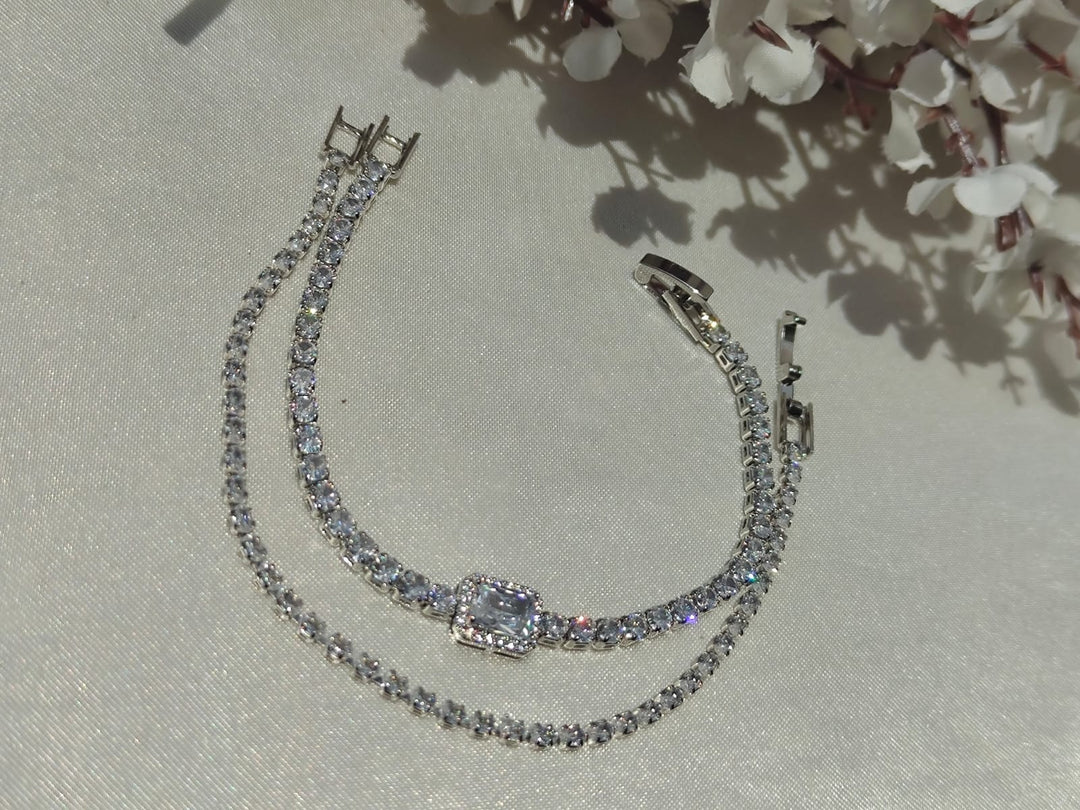 Luxury silver bracelet set featuring dazzling premium-cut stones with an elegant statement centerpiece ✨